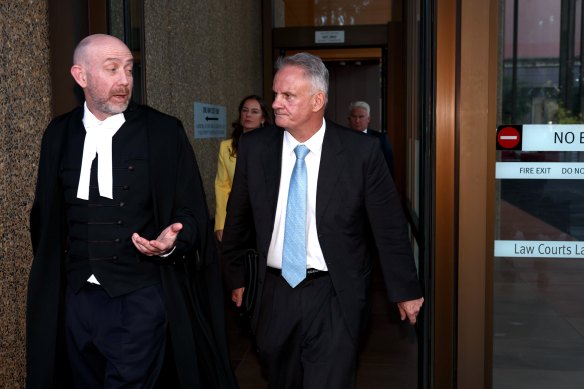 NSW independent upper house MP Mark Latham and his barrister Kieran Smark, KC, outside the Federal Court in Sydney.
