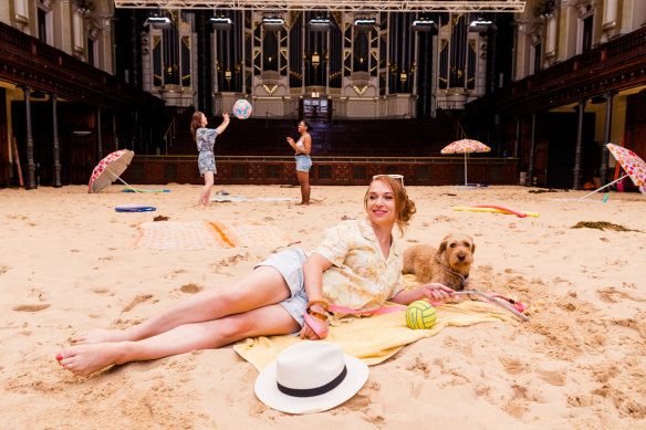 Festival director Olivia Ansell and Fleur soak up the atmosphere on the Town Hall ‘beach’.