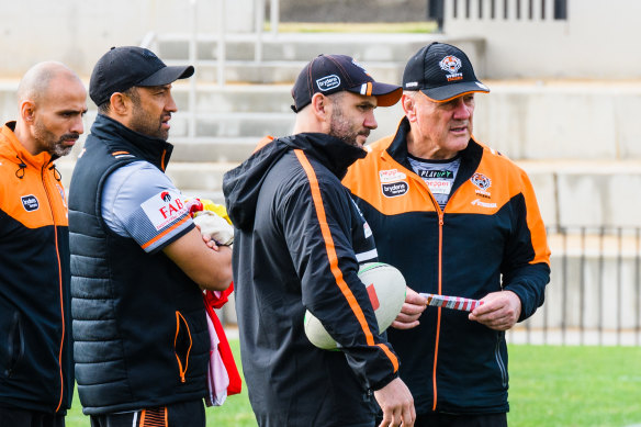Wests Tigers coach Tim Sheens (right) with Marshall and Farah at training.