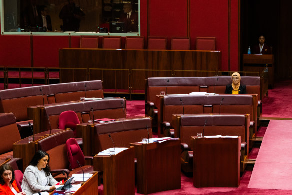 Senator Fatima Payman sits alone in the Senate on Thursday.