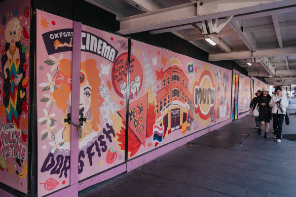 The side of Oxford Street closest to east-bound traffic is a construction site while three blocks leased from the City of Sydney are being redeveloped.