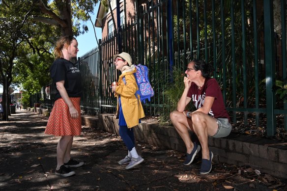 Aine Healy and Emma Wood, two of the organisers of Marrickville Public School’s inclusive education P&C sub-committee, with a friend’s daughter Edie Proud.