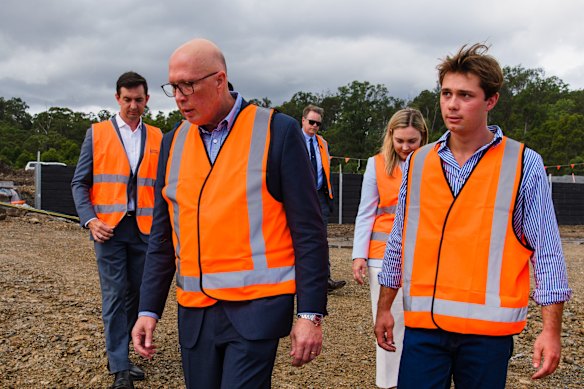 Peter Dutton and his son Harry on the campaign trail.