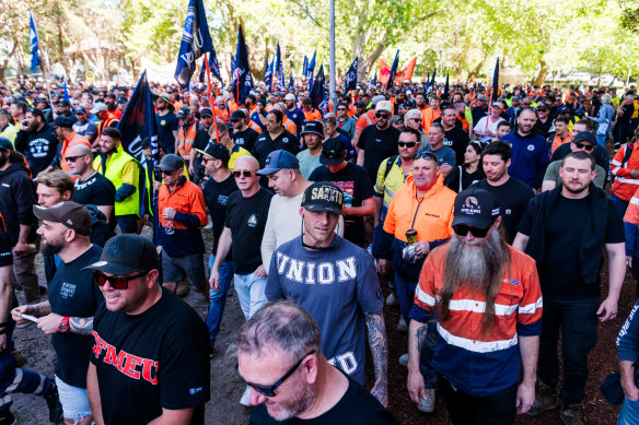 Workers march along Macquarie Street to NSW Parliament.