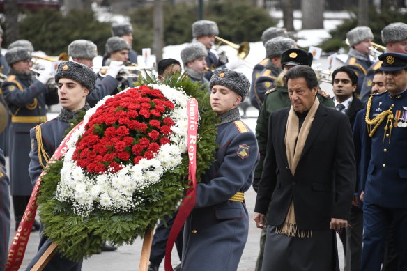 Pakistan’s Prime Minister Imran Khan, centre right, takes part in a wreath-laying ceremony in Moscow.