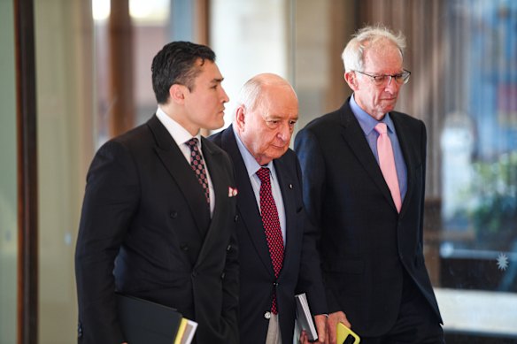 Alan Jones arrives at the Downing Centre Local Court on Wednesday.
