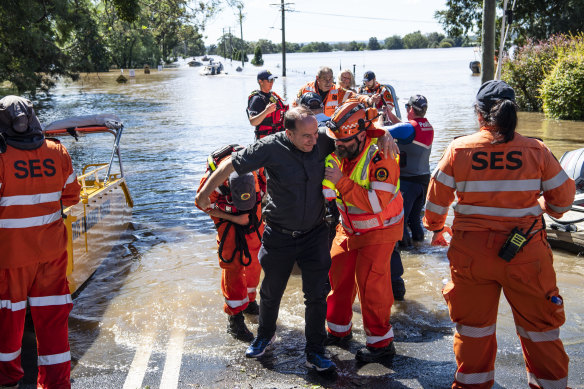 State Emergency Services assisting people affected by large floods near Sydney in March.