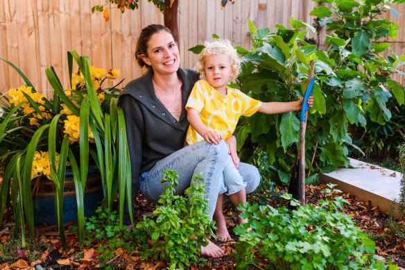 Caroline McGuigan, with son Milo, says she encourages her children to play in the dirt.