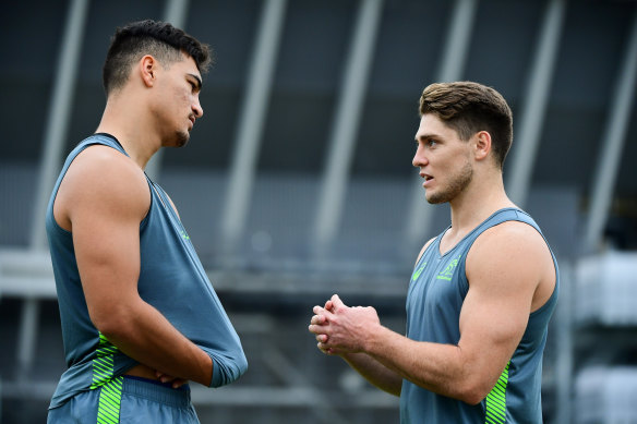 Jordan Petaia (left) and James O'Connor chat during last year's Rugby World Cup. 