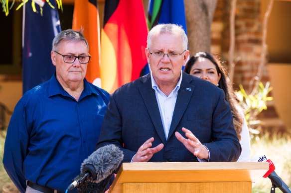 Prime Minister Scott Morrison promising law-and-order measures with the Coalition’s candidate, former Alice Springs mayor Damien Ryan.