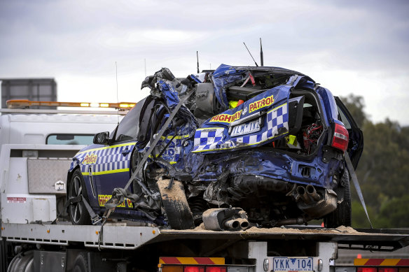 One of the police cars being removed from the crash scene in April 2020.