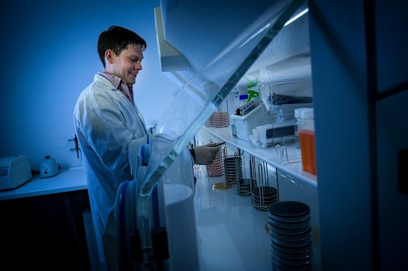 Dr Sam Forster, a Hudson Institute researcher, seen in the lab in 2019.
