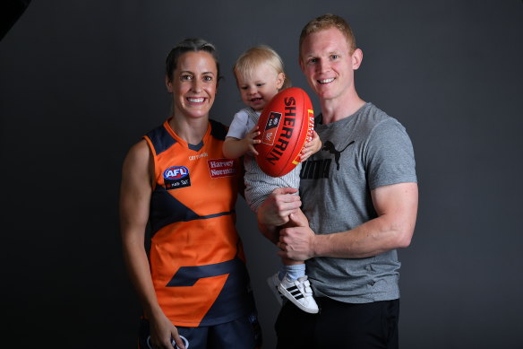 Brid Stack with her husband, Cárthach, and son, Cárthach Óg. The Irishwoman is back in the AFLW after her debut season ended before it began due to a traumatic neck injury.