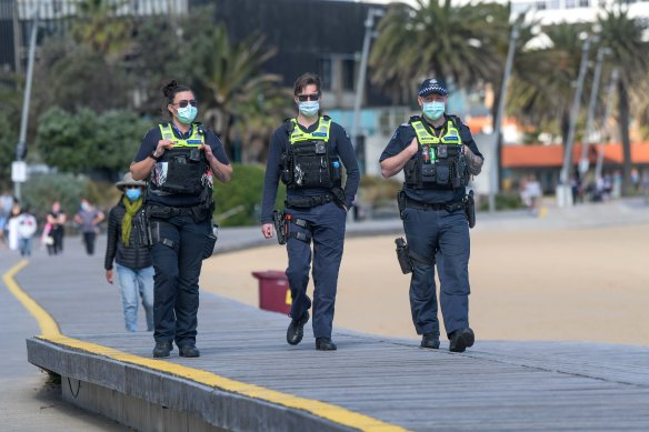 Police patrol St Kilda Beach on Wednesday.