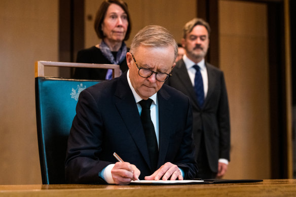 Australian Prime Minister Anthony Albanese signing the Queen’s book of condolences at Parliament House, Canberra, on September 9.