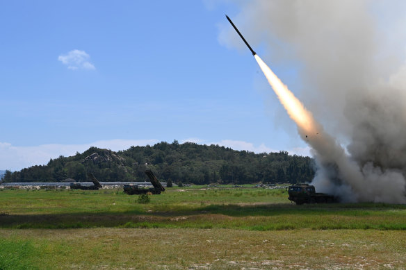 In this photo released by China’s Xinhua News Agency, a projectile is launched from an unspecified location in China during long-range live-fire drills on Thursday.