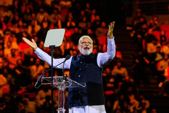 Narendra Modi addresses a stadium packed with supporters at Homebush Bay during his visit to Sydney.