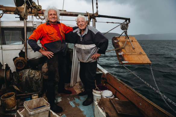Fisherman Santo La Macchia (right), who turns 101 on Tuesday, with his son and skipper “Young Bobbie”, 75. 