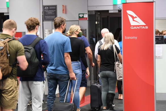 Qantas passengers will now board in groups.