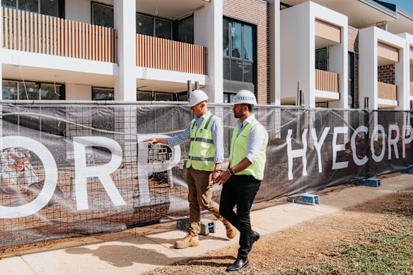 NSW Building Commissioner James Sherrard inspects a building in Willoughby with Hyecorp managing director Troy Abolakian. Sherrard said it was an exemplary site.