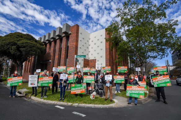 Angry Elsternwick residents protest outside Woolworths’s site in 2021.
