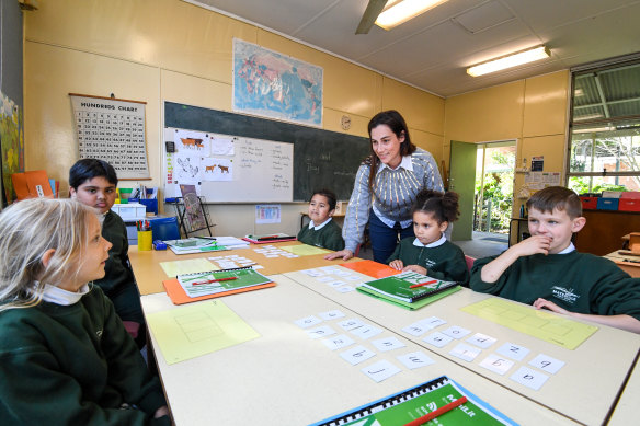 A group of students at Matraville Public School receive small-group tuition as part of the COVID-19 tutoring program.