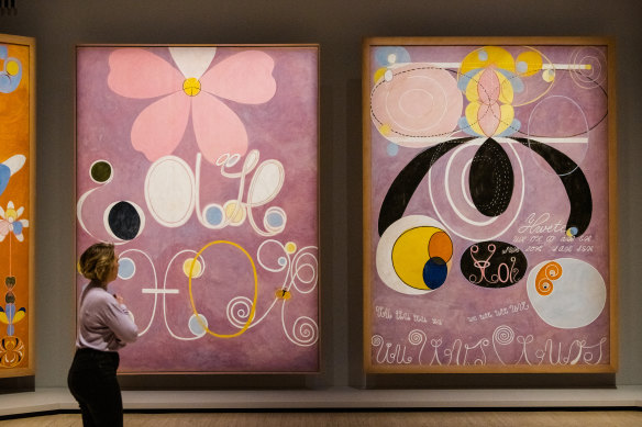 A viewer takes in Hilma af Klint’s The Ten Largest collection, part of her show The Secret Paintings at the Art Gallery of NSW. 