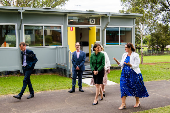 Premier Gladys Berejiklian and Education Minister Sarah Mitchell visit a mobile after-school care hub on Monday.