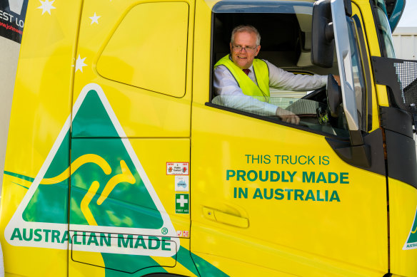 “Shakin’ and Bakin’“: Morrison is visibly energised by working a room, a factory floor, a sausage sizzle, or a warehouse, stopping for selfies, and handshakes, climbing into the cabs of trucks, as he is here in Brisbane, or whatever vehicle prop the occasion demands.