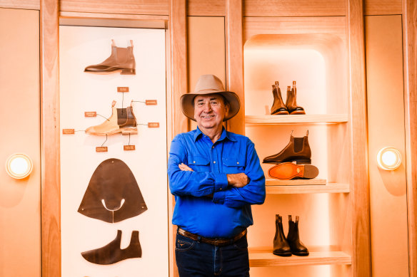 Terry Goodear, head of heritage at R.M. Williams, poses in an area dedicated to boot sales at the new flagship store in Sydney.