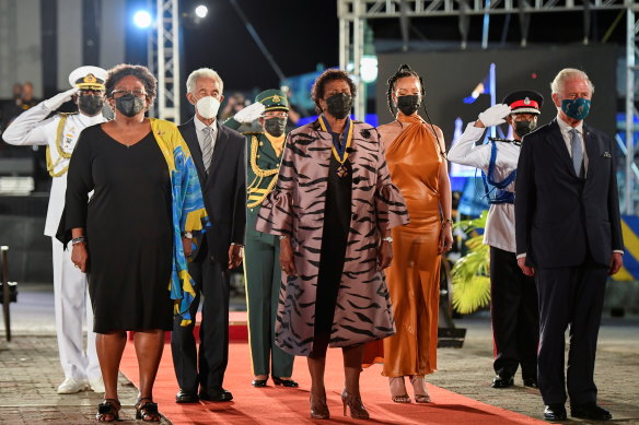 From left: Barbados Prime Minister Mia Mottley, former cricketer Garfield Sobers, Barbados President Dame Sandra Mason, Rihanna, and Prince Charles stand during the Presidential Inauguration Ceremony at Heroes Square in Bridgetown, Barbados on Tuesday. 