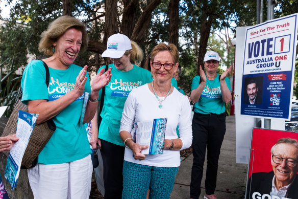 Independent candidate Helen Conway handing out how-to-vote pamphlets in North Sydney.