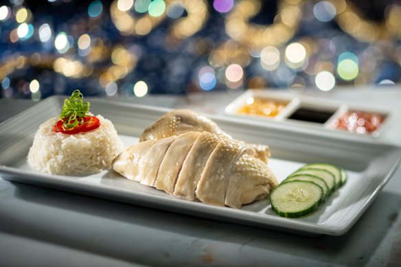 Hainanese chicken rice is on the menu, in a nod to the ship’s home port.