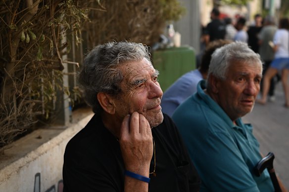 Beersheba resident Victor Kasabi (left), a veteran of the Yom Kippur War, says he wants to see regime change in Iran. 