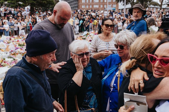 The family of 10-year-old Matilda, who died during Sunday’s terrorist attack, at the Bondi Beach memorial.