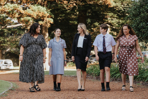Rebecca King and her daughter Madison, principal Gabie Stojanovski and Joanna McNamara with her son Billy, 12.