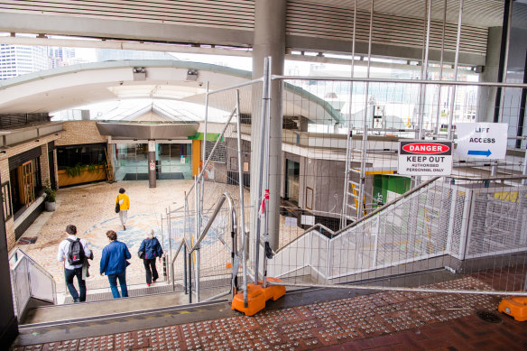 The last few remaining businesses were required to vacate the shopping centre by 4pm on Friday.