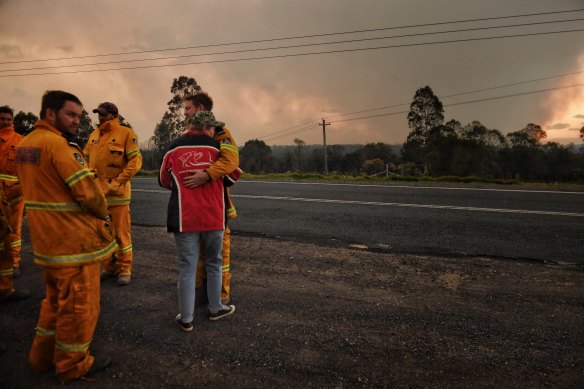 Silverdale Brigade members reunited with partners after working on the The Peaks fire. 