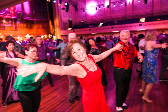 Jessica Coyle and Zyg Wawrzycki, both wearing red, at the Big Bad Dance.