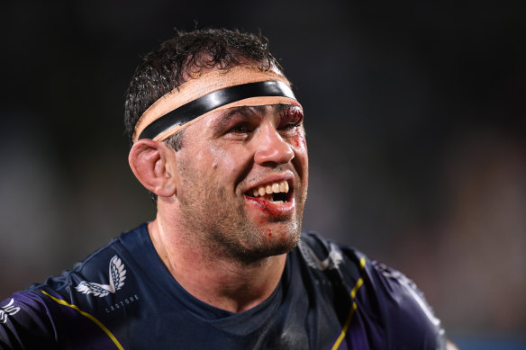 Battered, bloody and loving it: Finucane during his Storm days.