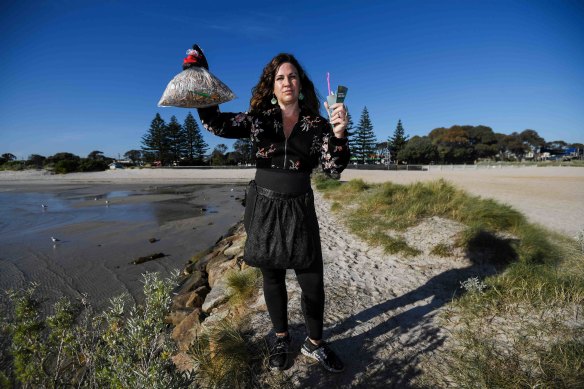 Anti-litter campaigner Josie Jones with some of the cigarette butts she has collected from Rye beach. 