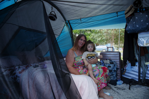 Karrina Kemp and her three children are living in a tent in Ballina while paying rent in Bundaberg, QLD, because they still don’t have their border pass. 