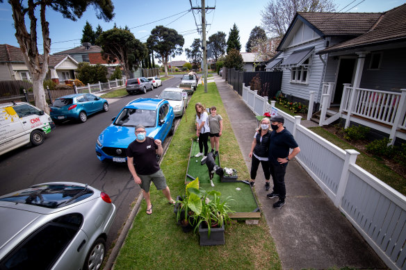 Ian Hillman (left) came up with the idea for the mini-golf tournament.