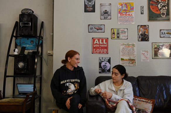 Martelle Jackson (left), the owner of The Shave Cave, with her friend Ella Dixon, who wants to know more before she makes up her mind about the wind farm.