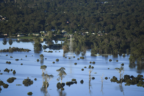 Flood-affected areas are seen from a helicopter in the Windsor and Pitt Town region. 