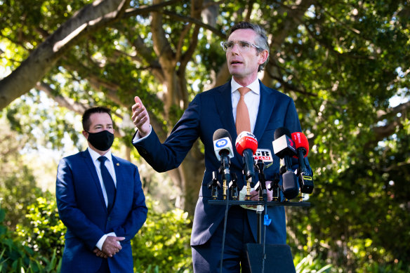 NSW Premier Dominic Perrottet and Deputy Premier Paul Toole, left, this afternoon.