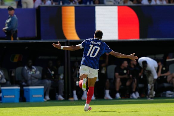 Mbappe celebrates.