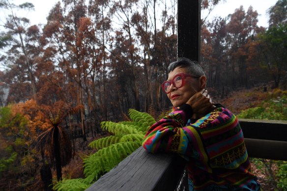 Artist and fashion designer Jenny Kee is thrilled to see regrowth of native plants in the backyard after it was ravaged by bushfire.