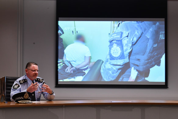 AFP Deputy Commissioner Nigel Ryan displays items seized during raids after the Ironside operation.