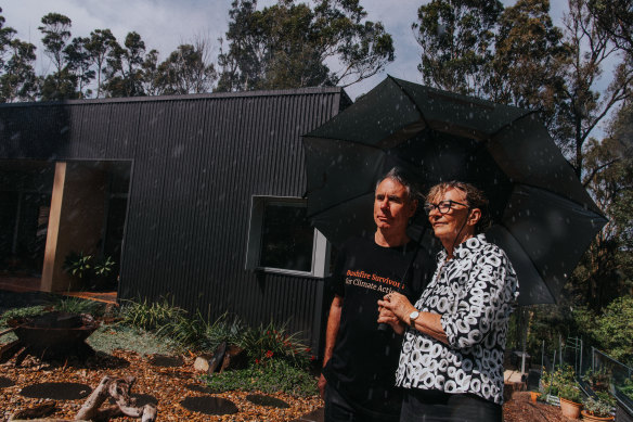 Jack Egan and Cath Bowdler hae rebuilt their house but not their community.